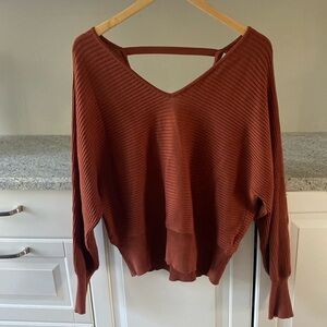 Rust coloured sweater wear front or backwards convertible size large